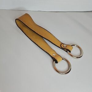 Tan Leather Bag Strap with Silver Hardware.